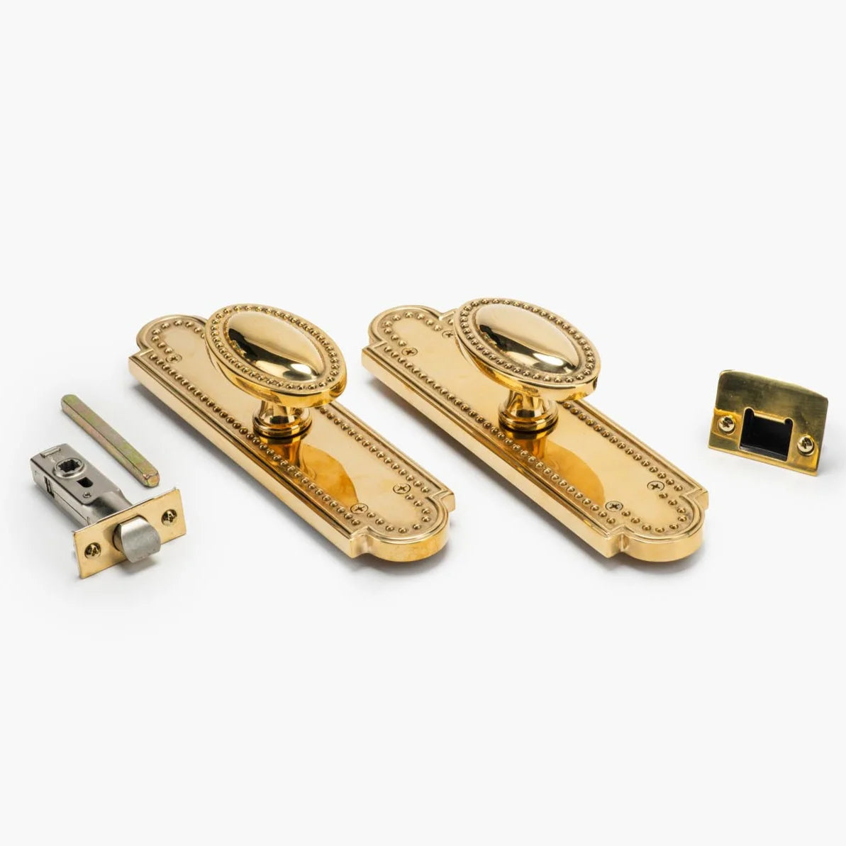 Louis Vertical Brass Passage Door Knob Set