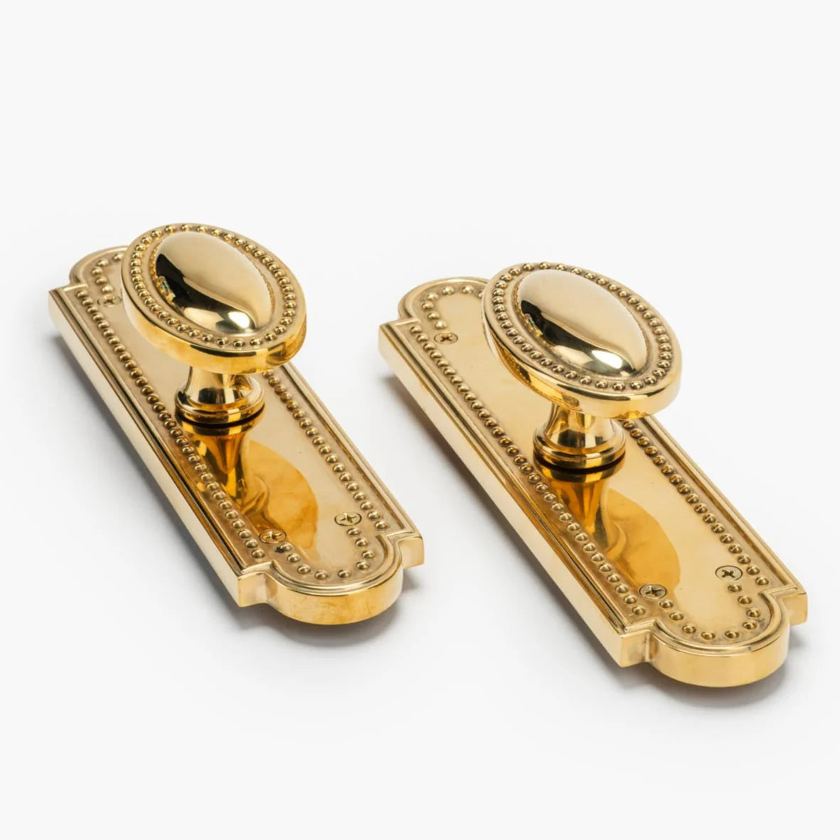 Louis Vertical Brass Passage Door Knob Set