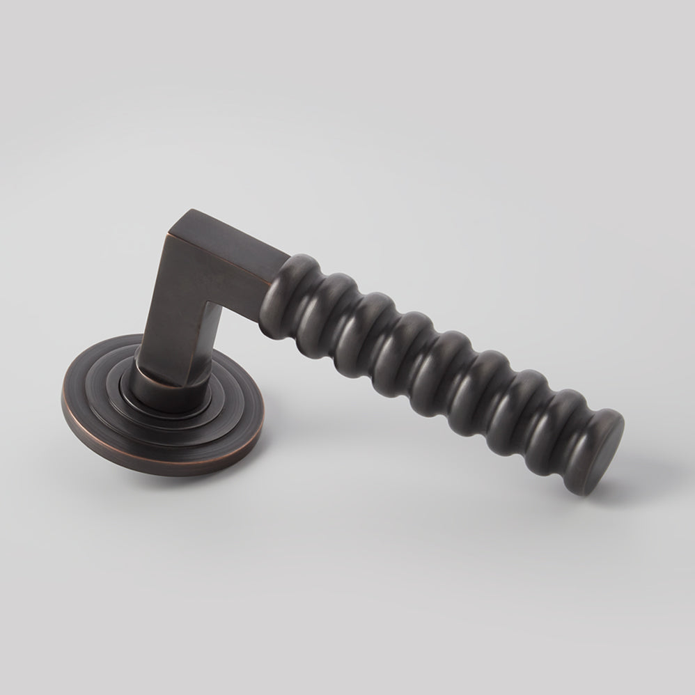 Rutland Door Lever on Double Step Round Rose