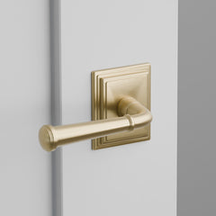 Merrimack Door Lever on Wilshire Rosette