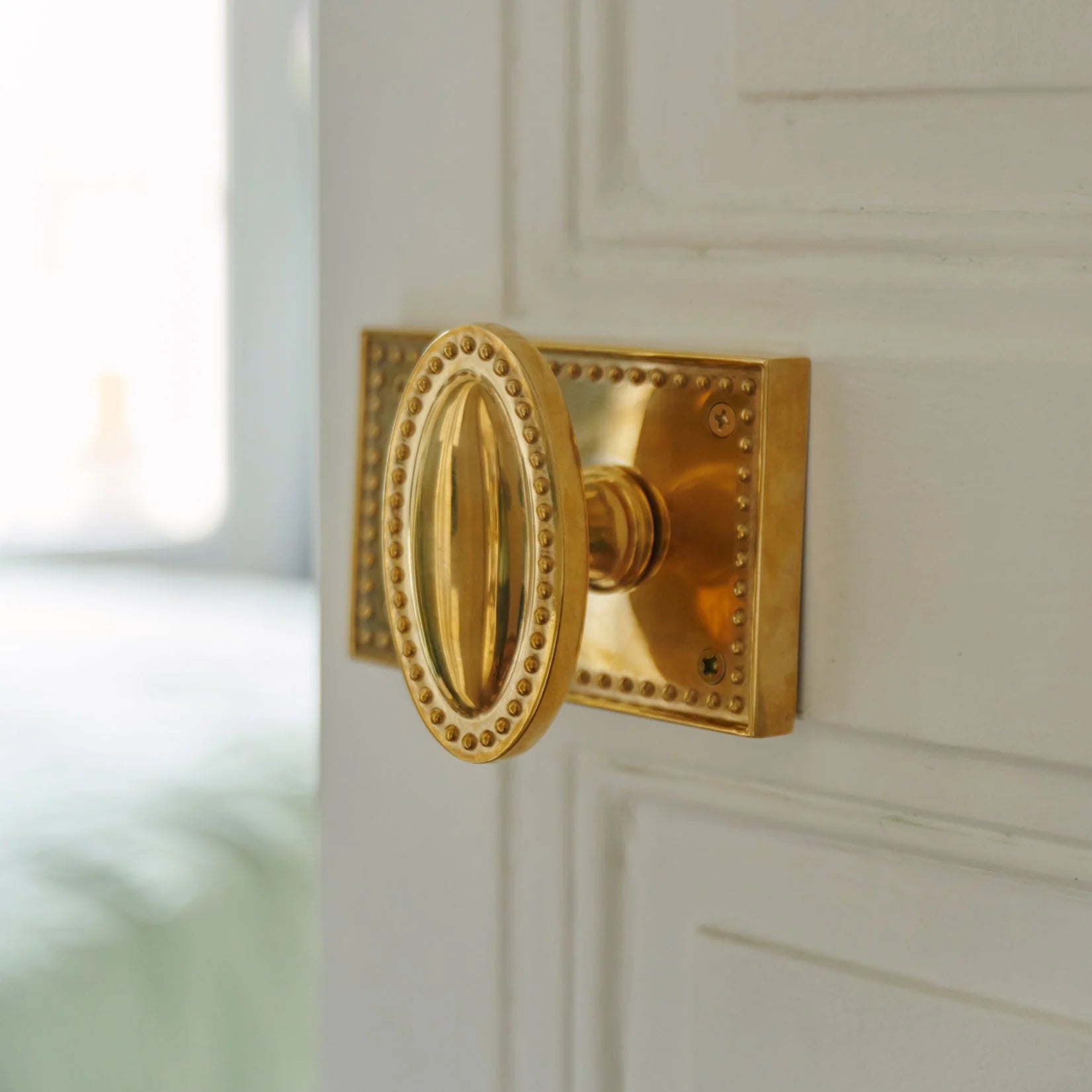 Louis Horizontal Passage Brass Door Knob Set